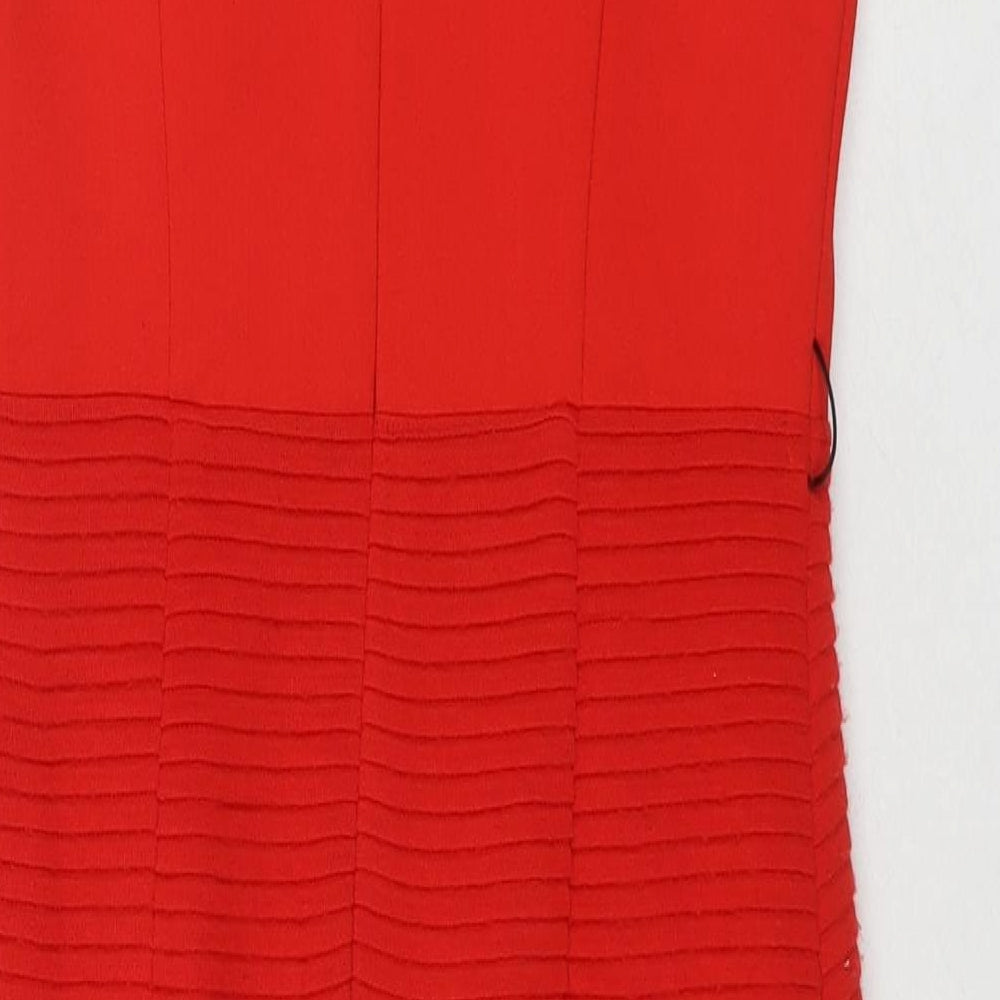 Brand and care label for Betty Jackson women’s red polyester a-line, size UK 10, round neck pullover