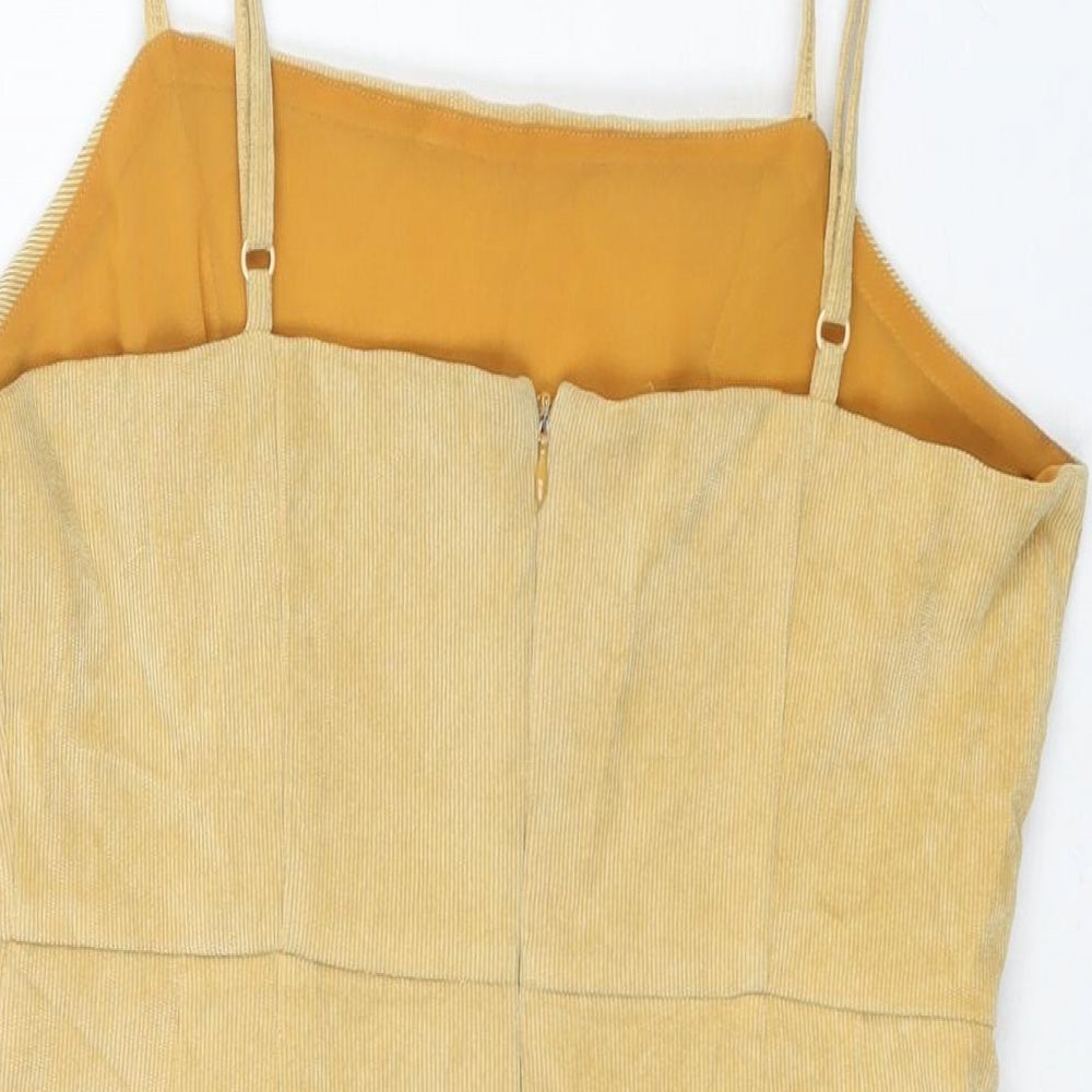 Brand and care label for Cooperative women’s yellow cotton mini, size M, square neck zip