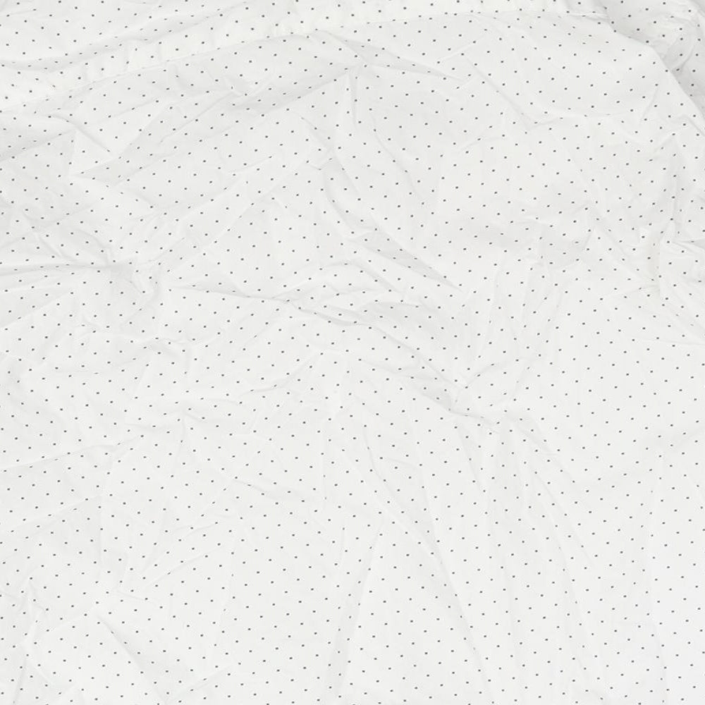 Brand and care label for French Connection men’s white polka dot cotton button-up, size S, collared button