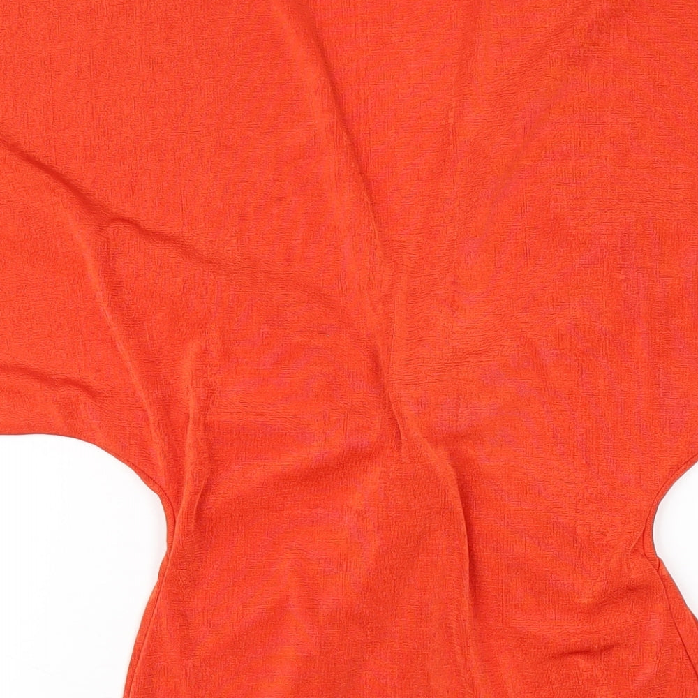 Brand and care label for Missguided women’s orange polyester bodycon, size UK 4, v-neck pullover