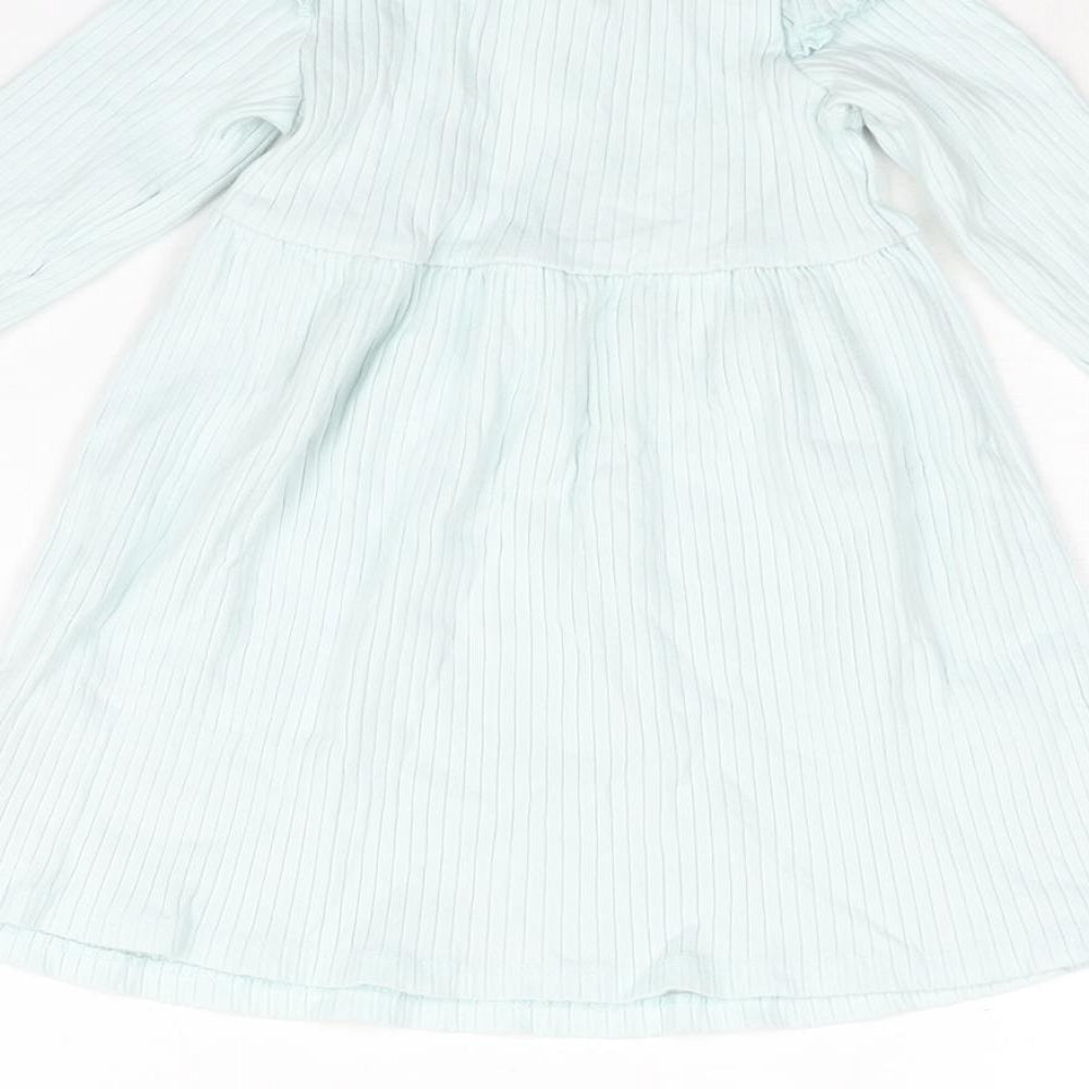 Brand and care label for Disney girls’ blue cotton a-line, size 12-18, months round neck button - daisy duck print