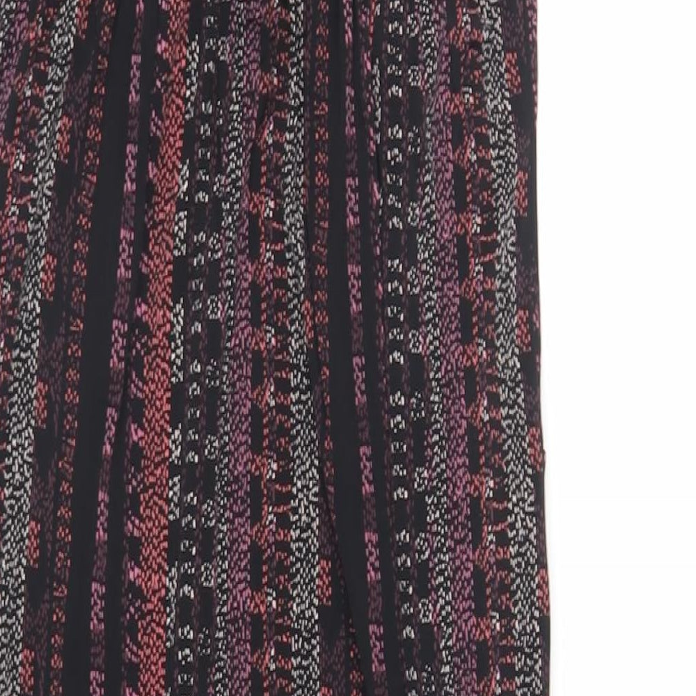 Brand and care label for BCBGeneration women’s black geometric polyester slip dress, size S, v-neck pullover