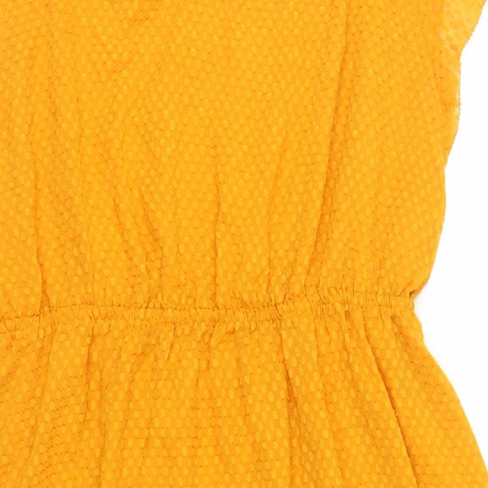 Brand and care label for H7M women’s orange polyester a-line, size UK 12, round neck button - textured