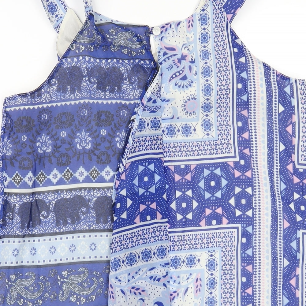Brand and care label for Tammy Girl girls’ blue paisley polyester basic t-shirt, size 12-13, years scoop neck button