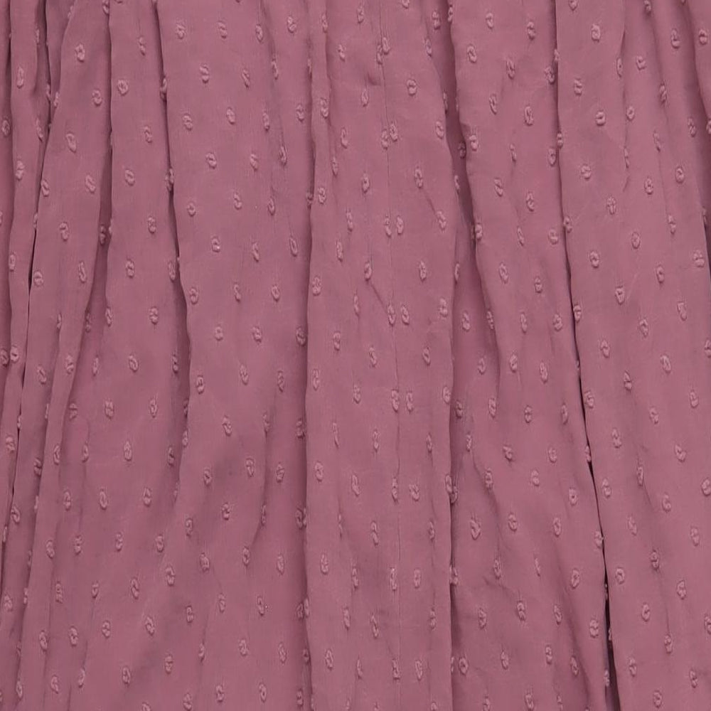 Brand and care label for Missguided women’s purple polyester a-line, size UK 10, mock neck button