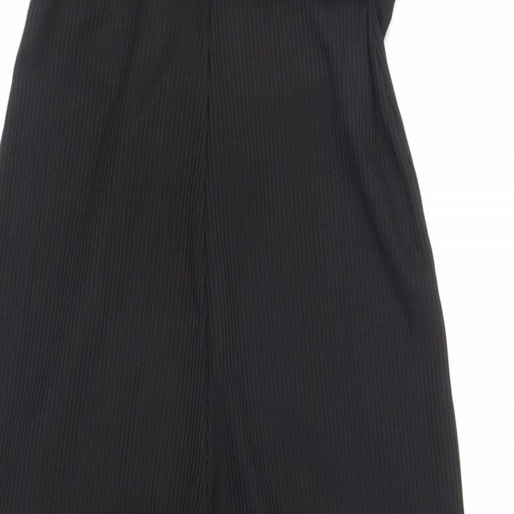 Brand and care label for Miss Selfridge women’s black polyester jumpsuit one-piece, size UK 4, 20-inch leg pullover - belted