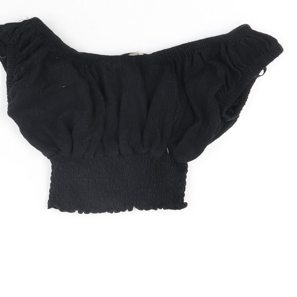 Brand and care label for Miss E-Vie girls’ black cotton cropped t-shirt, size 7-8, years off the shoulder pullover