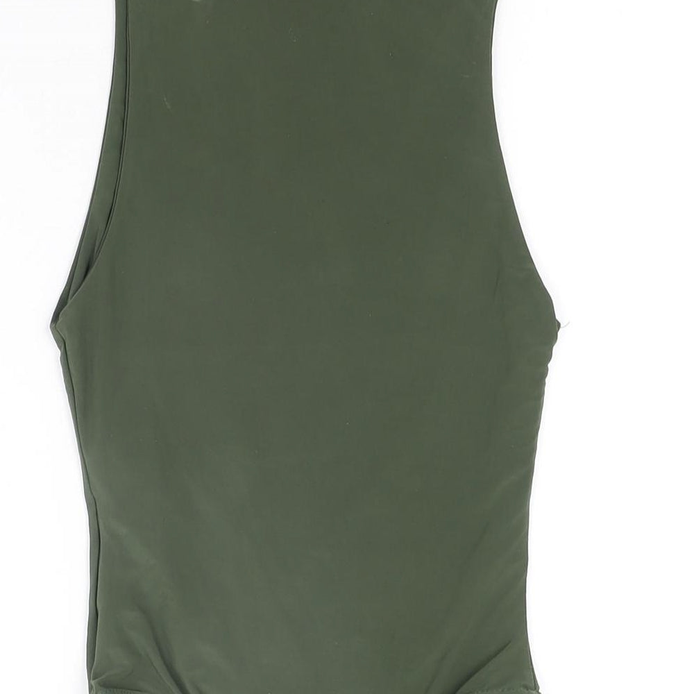 Brand and care label for Missguided women’s green polyester bodysuit one-piece, size UK 6, snap