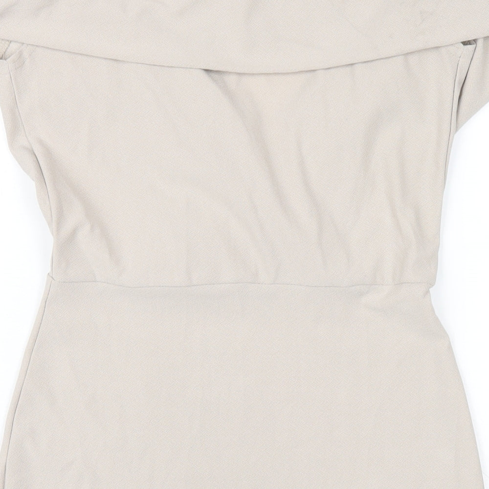 Brand and care label for Missguided women’s beige polyester bodycon, size UK 10, off the shoulder pullover