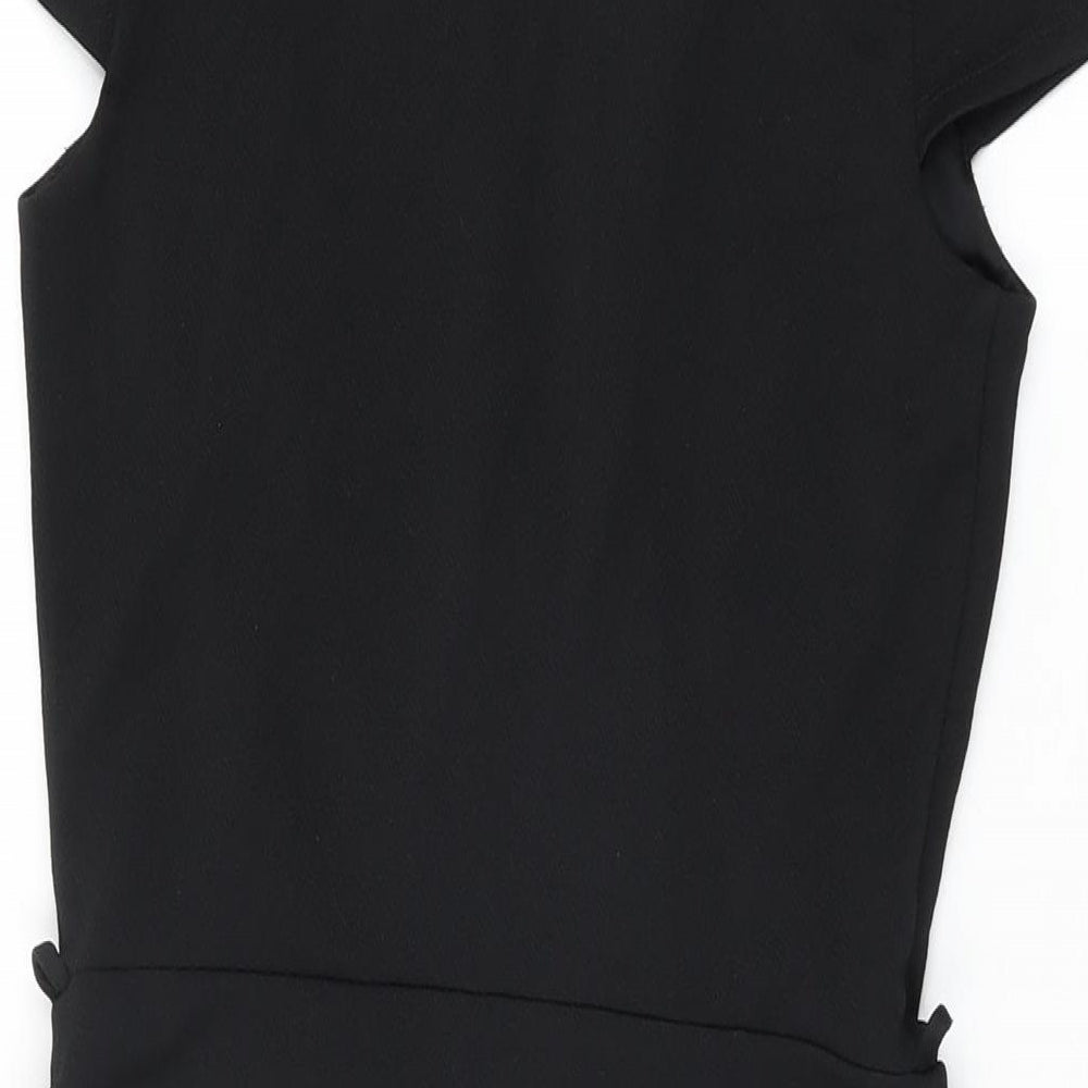 Brand and care label for Miss Selfridge women’s black polyester bodycon, size UK 10, v-neck pullover