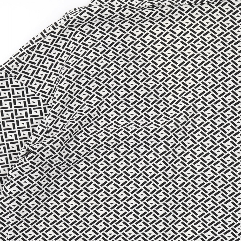 Brand and care label for Miss Selfridge women’s beige geometric jacket, size UK 8