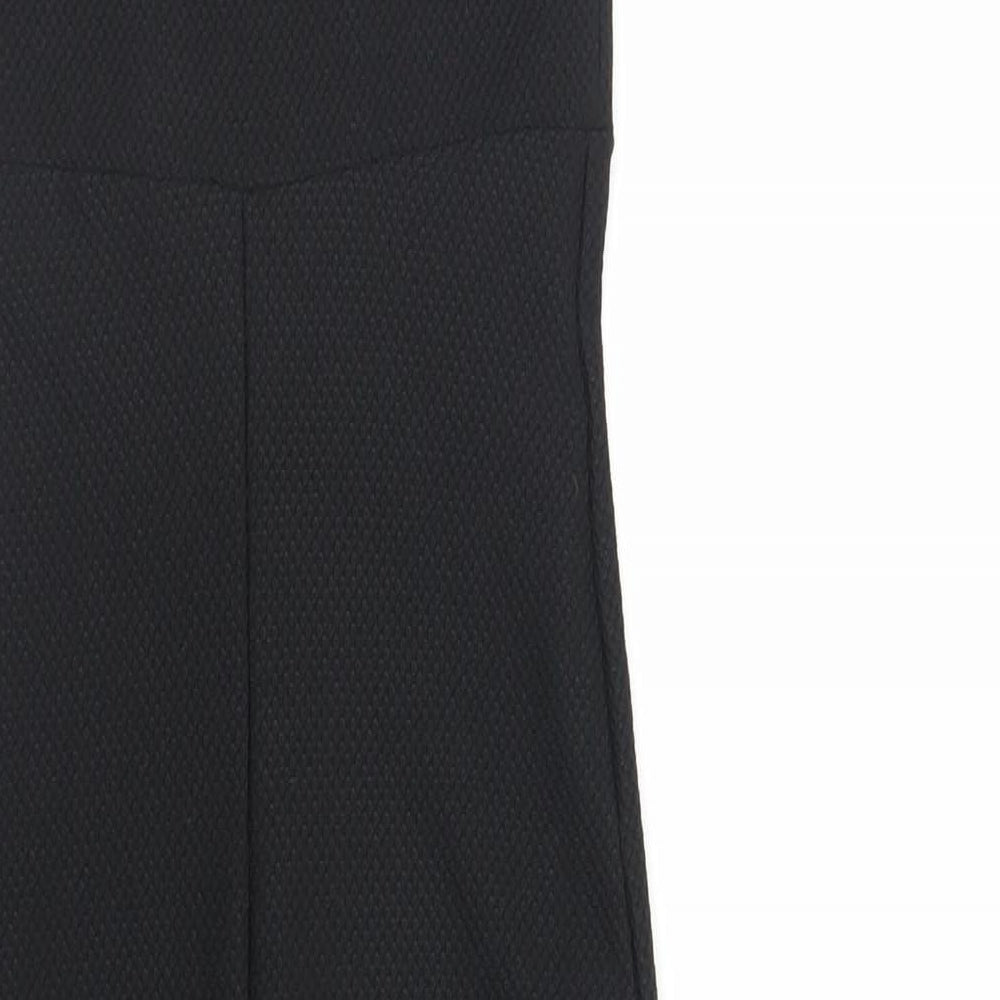 Brand and care label for Miss Selfridge women’s black polyester bodycon, size UK 10, sweetheart pullover