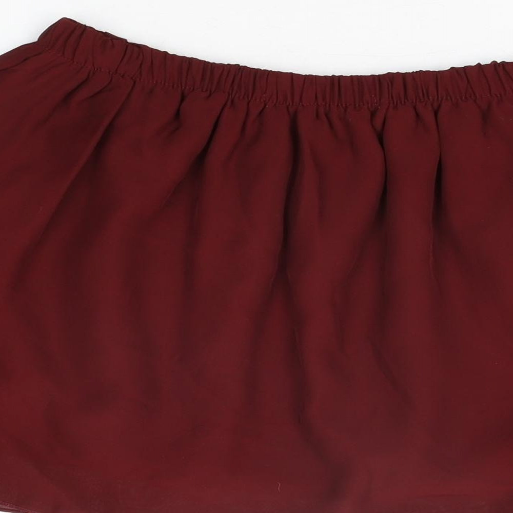 Brand and care label for Missguided women’s red polyester mini skirt, size S, -, size S/m