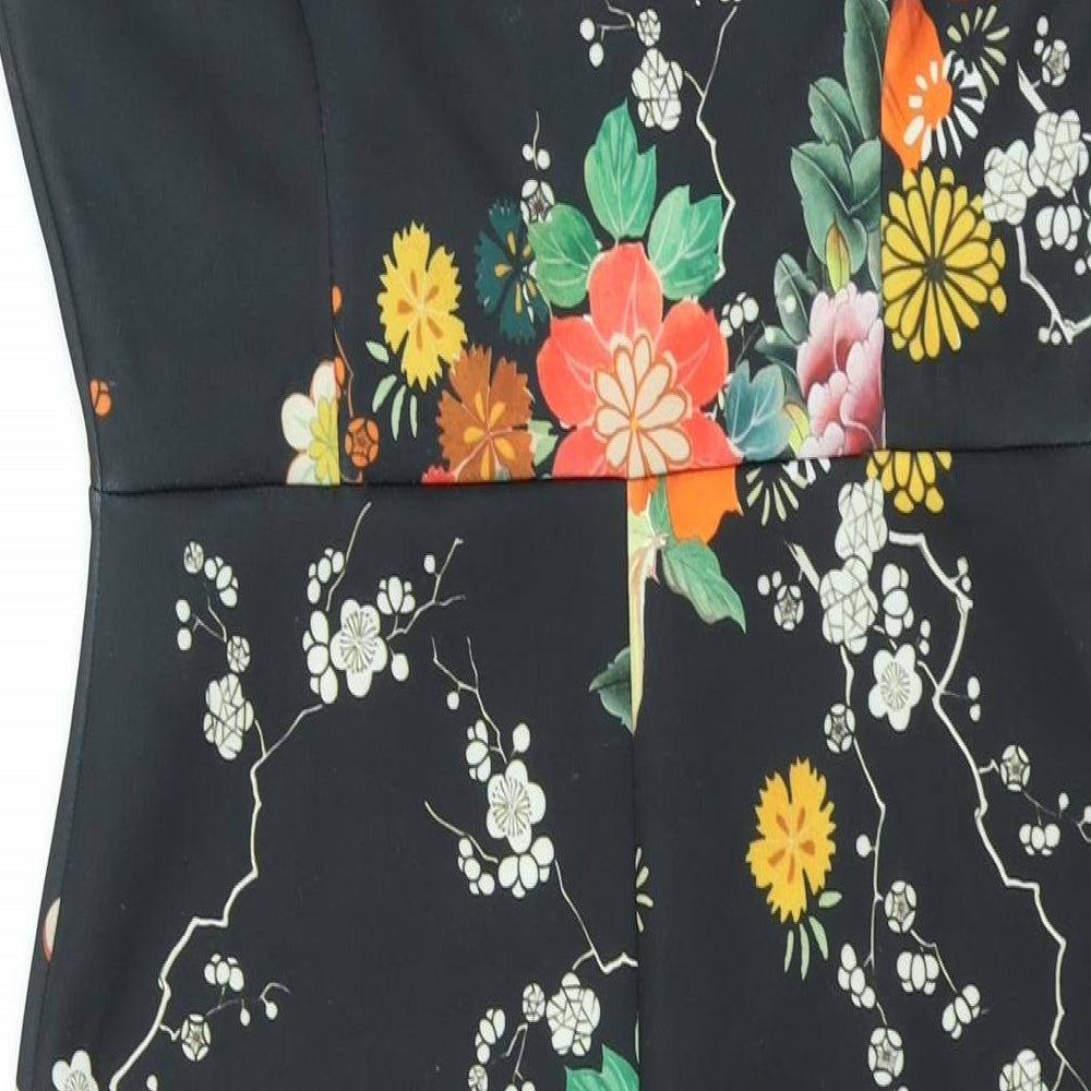 Brand and care label for Red Herring women’s black floral polyester bodycon, size UK 10, off the shoulder pullover