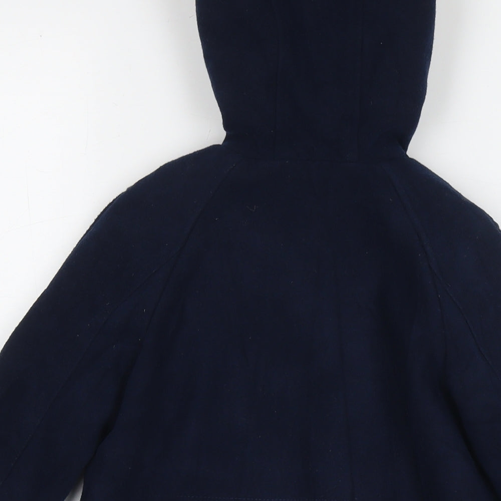 Brand and care label for Minoti boys’ blue overcoat coat, size 4-5, years zip
