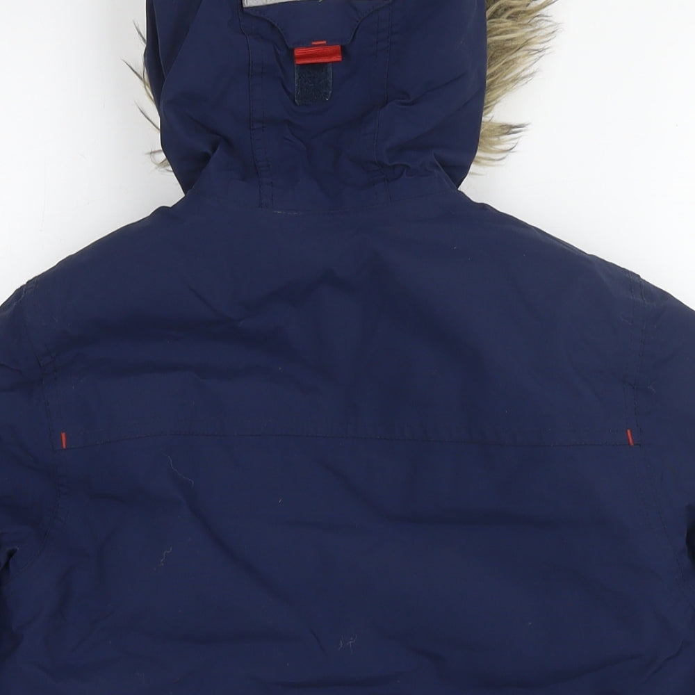 Brand and care label for Decathlon boys’ blue jacket, size 6, years zip