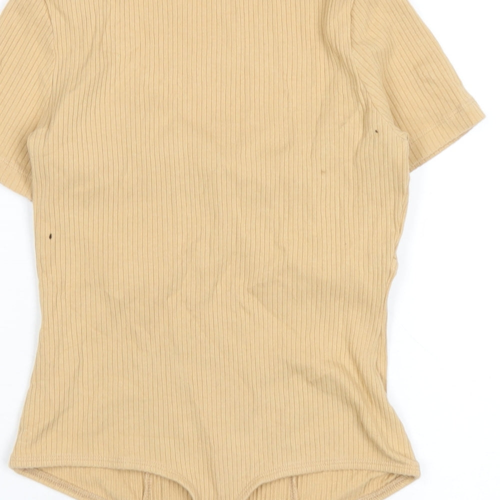 Brand and care label for ASOS women’s beige cotton bodysuit one-piece, size UK 8, snap