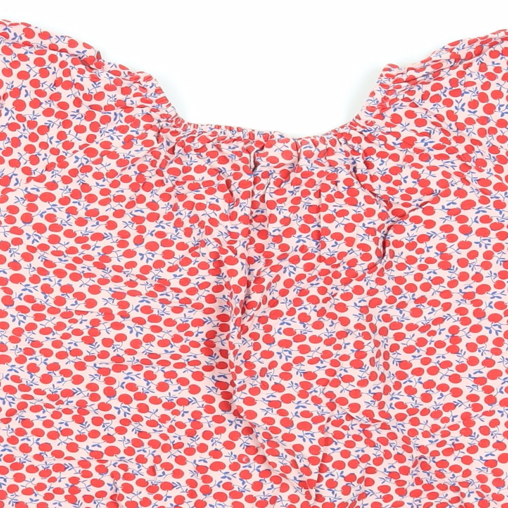 Brand and care label for Next girls’ red geometric viscose basic blouse, size 12, years off the shoulder pullover