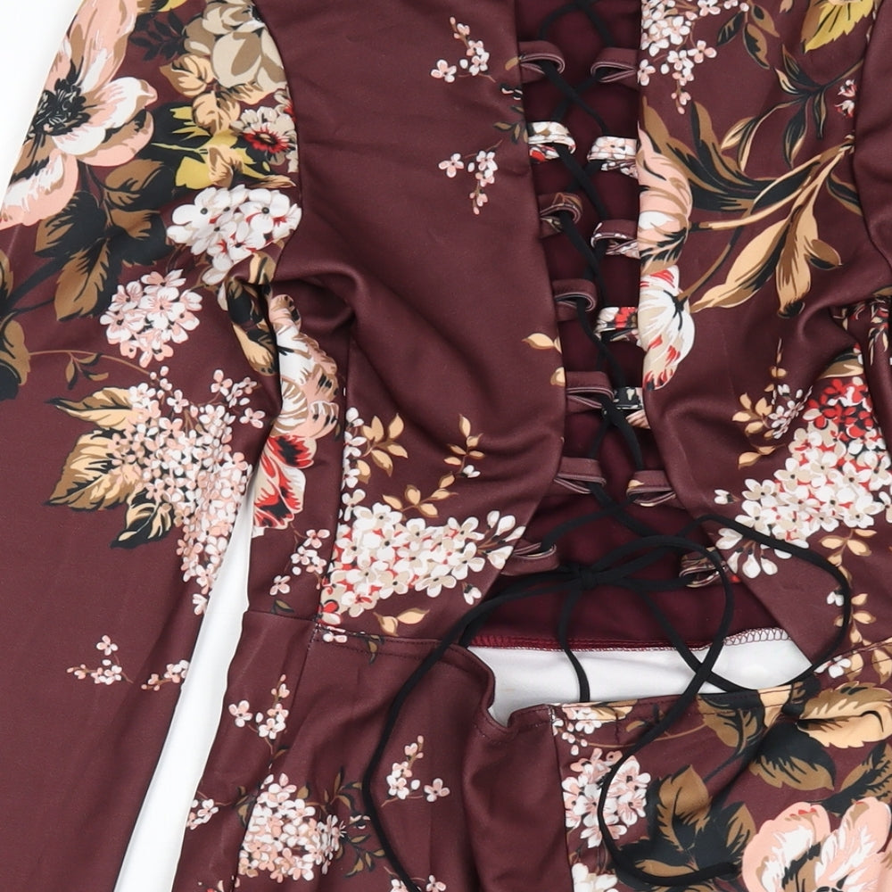 Brand and care label for Missguided women’s brown floral polyester bodycon, size UK 12, round neck pullover