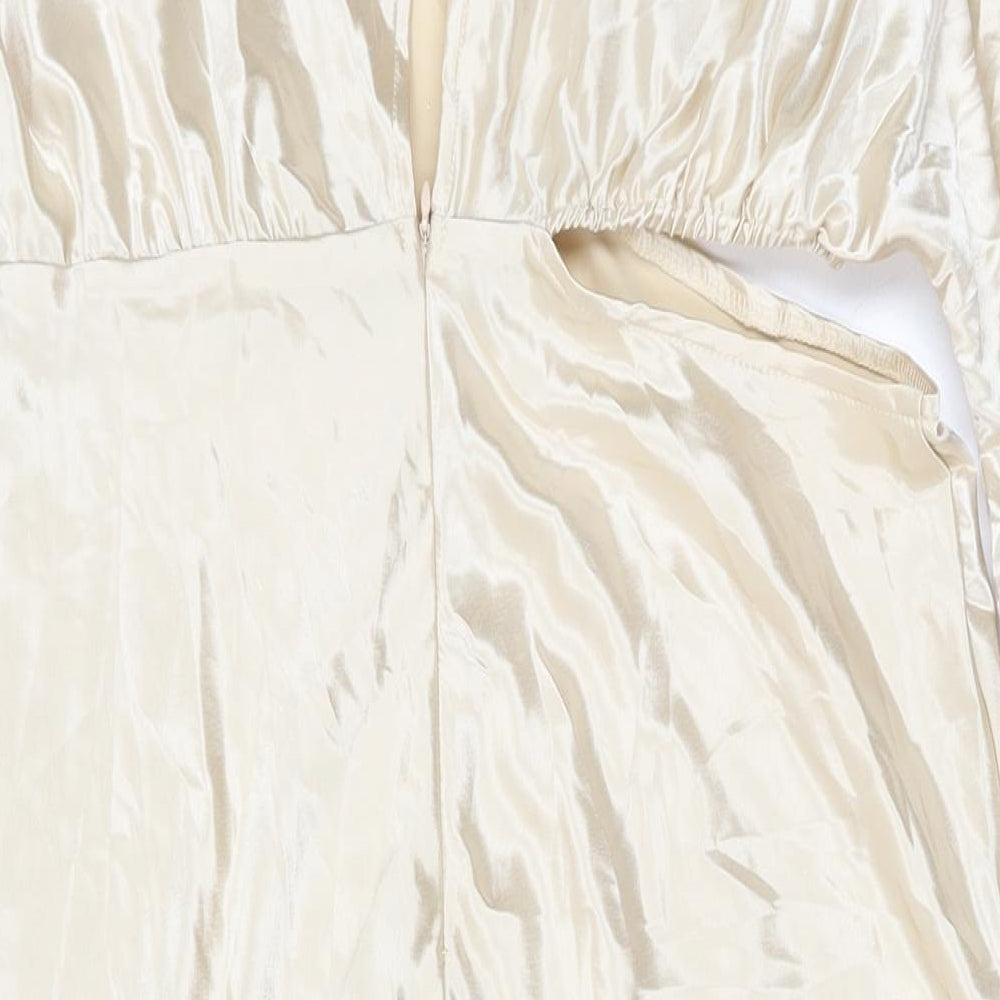 Brand and care label for In the Style women’s beige polyester maxi, size UK 14, one shoulder zip