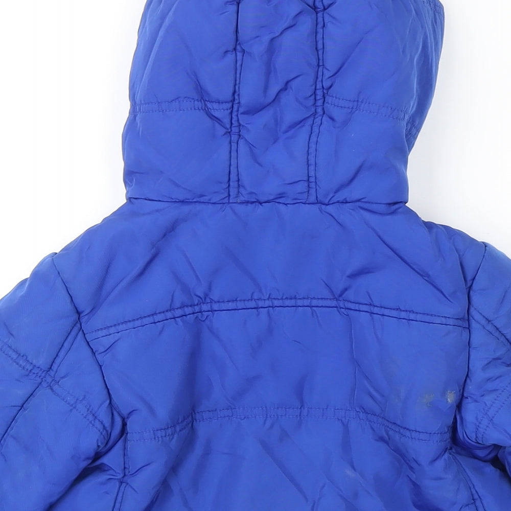 Brand and care label for United Colors of Benetton boys’ blue puffer jacket coat, size 4-5, years zip
