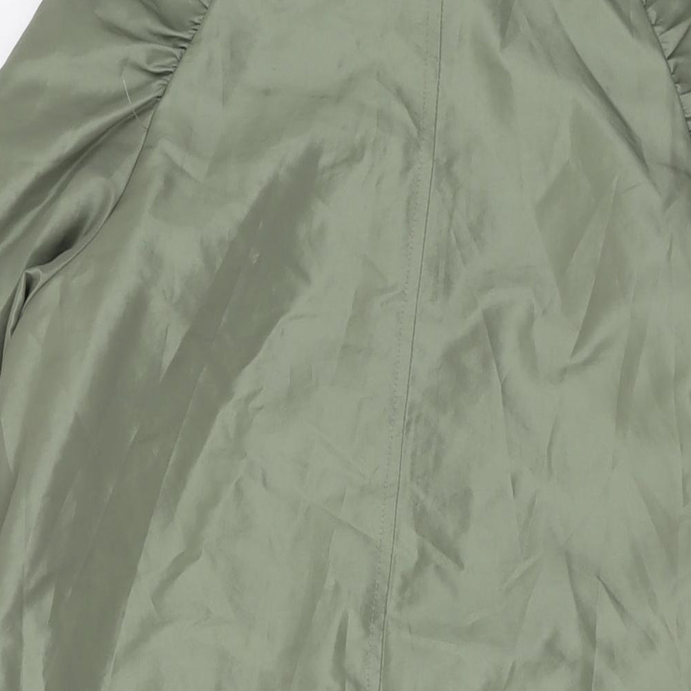 Brand and care label for Red Herring women’s green jacket, size UK 10, zip