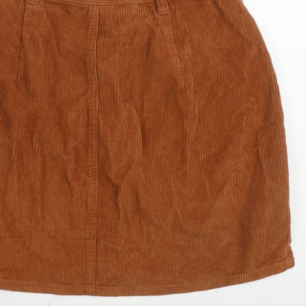 Brand and care label for ASOS women’s brown cotton a-line skirt, size UK 8, zip
