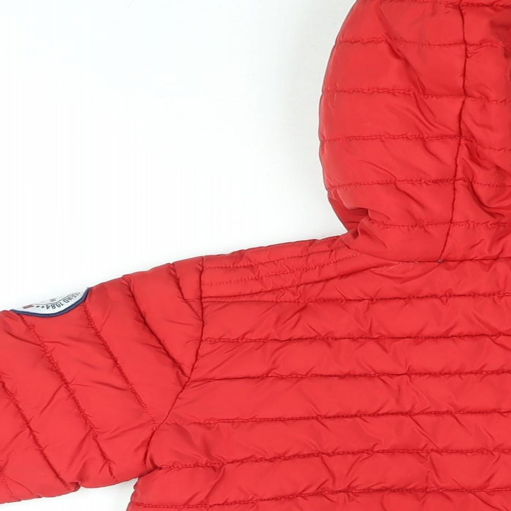 Brand and care label for Redskins boys’ red puffer jacket coat, size 5, years zip