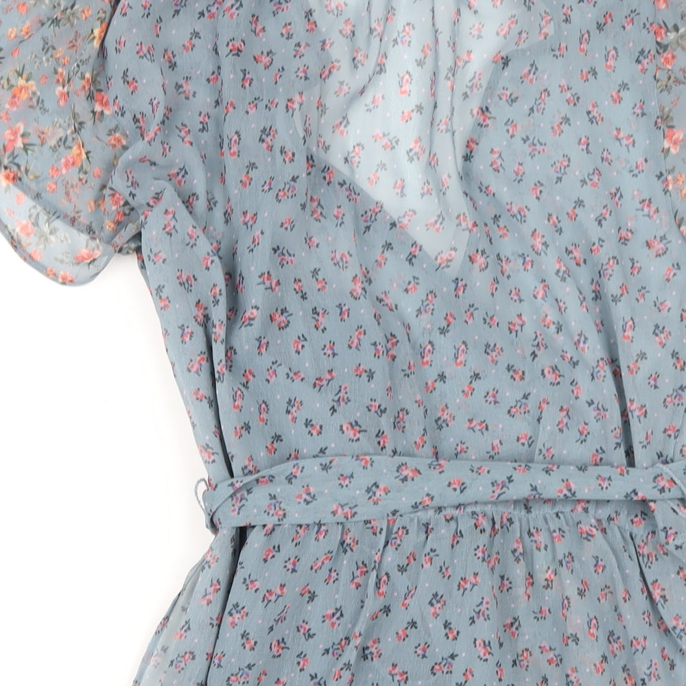 Brand and care label for French Connection women’s blue floral polyester a-line, size UK 6, v-neck zip