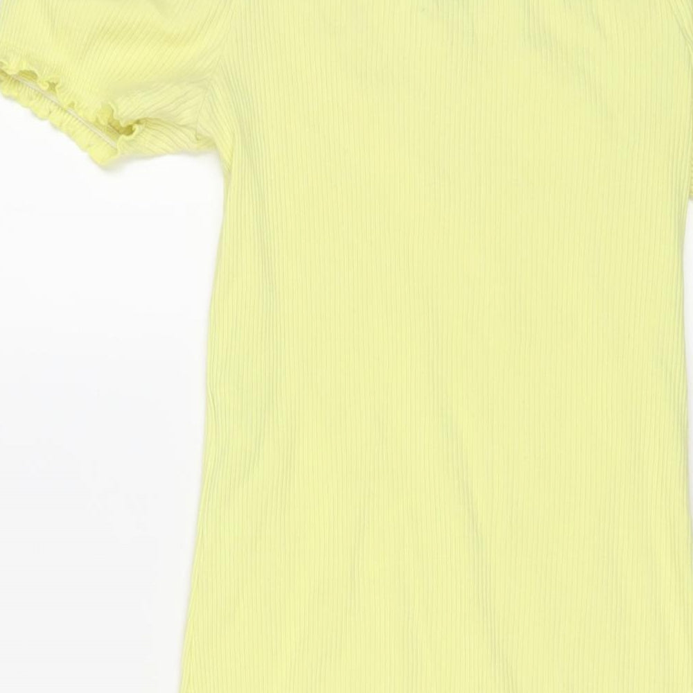 Brand and care label for Miss Selfridge women’s yellow polyester bodycon, size UK 12, square neck pullover