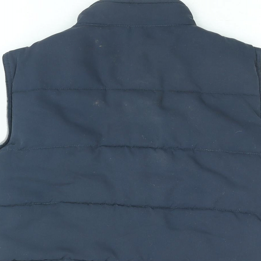 Brand and care label for St Bernard boys’ blue gilet coat, size 9, years zip