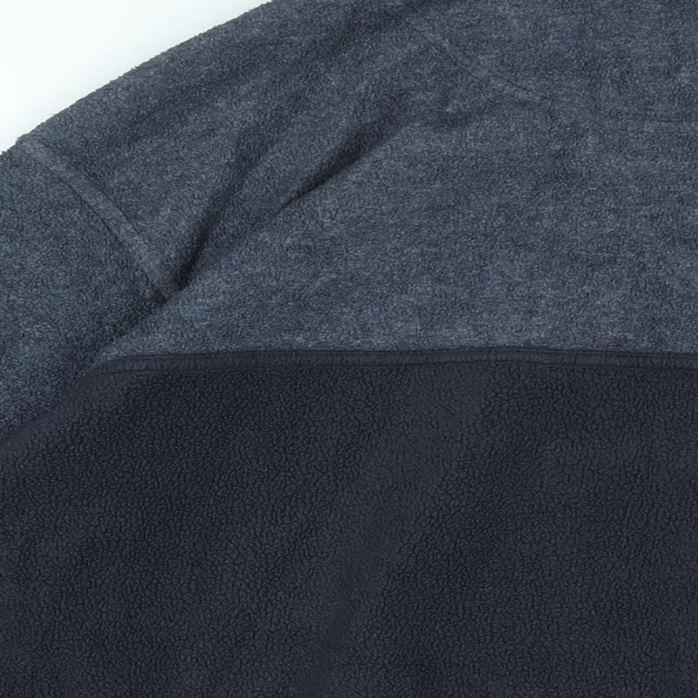 Brand and care label for CANDA men’s blue polyester pullover sweatshirt, size M