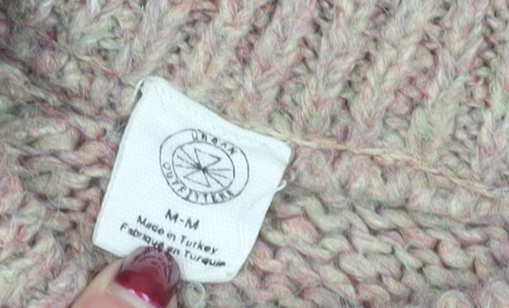 Brand and care label for Urban Outfitters Chunky-Knit jumper M