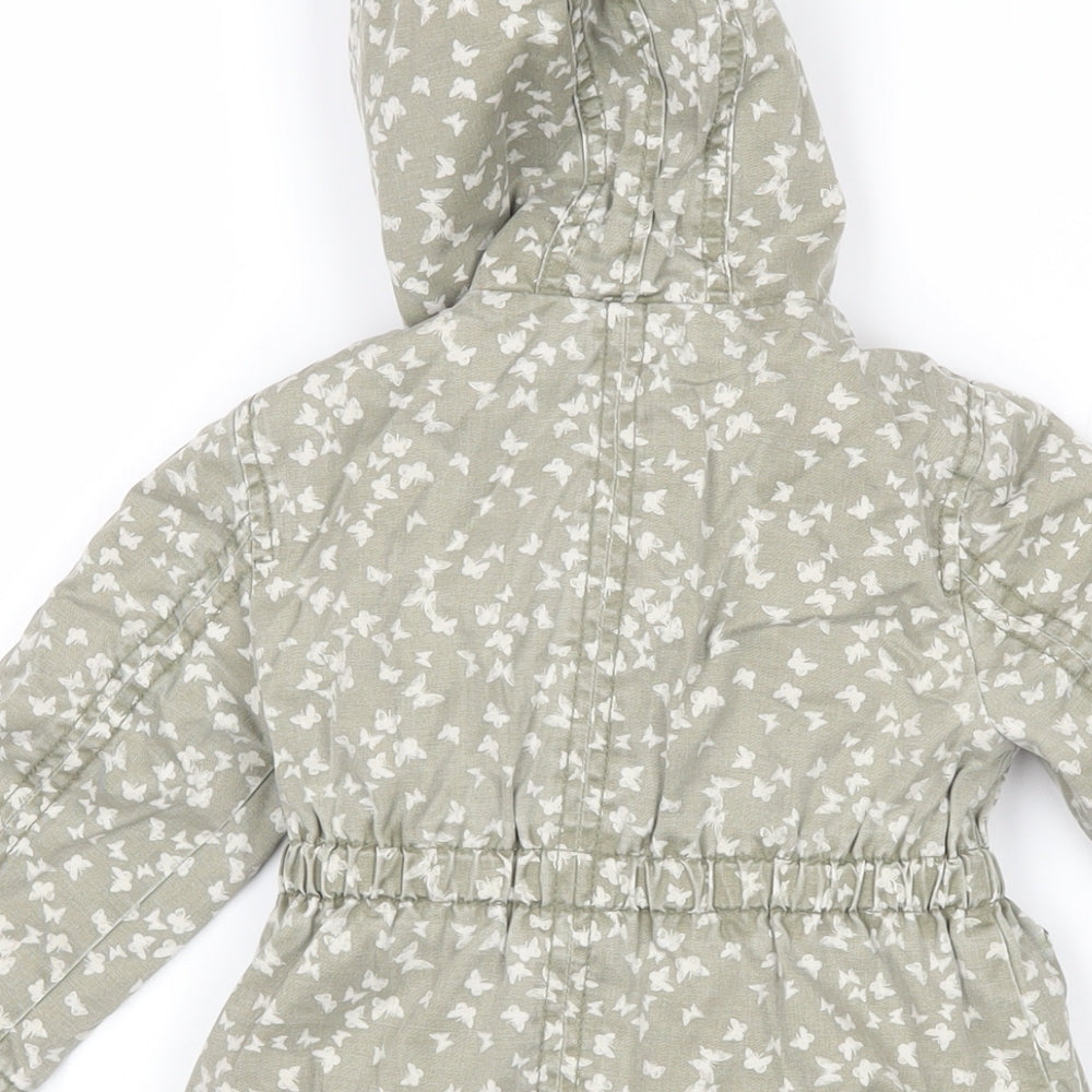 Brand and care label for Mothercare girls’ green geometric basic coat coat, size 12-18, months zip - butterflies