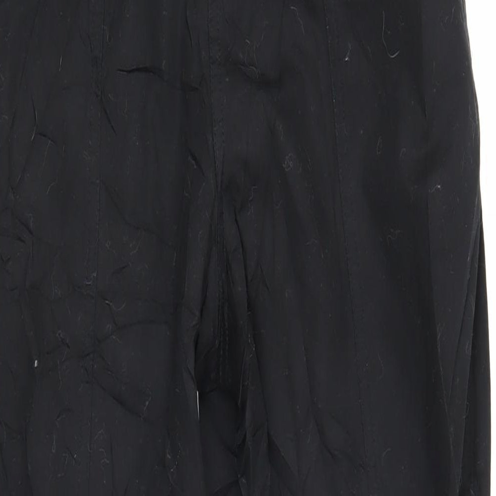 Brand and care label for ASOS women’s black cotton trousers, size UK 8, 25-inch leg regular zip