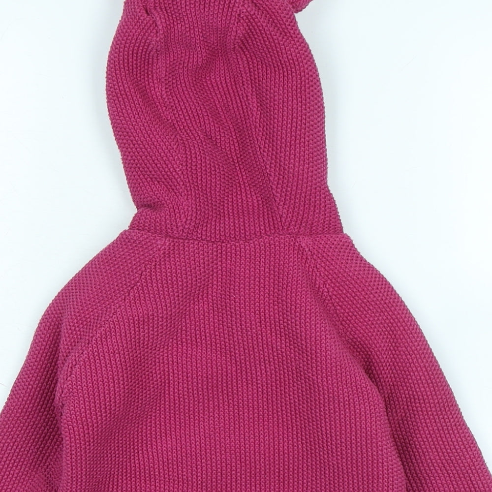 Brand and care label for John Lewis girls’ pink jacket, size 12-18, months button