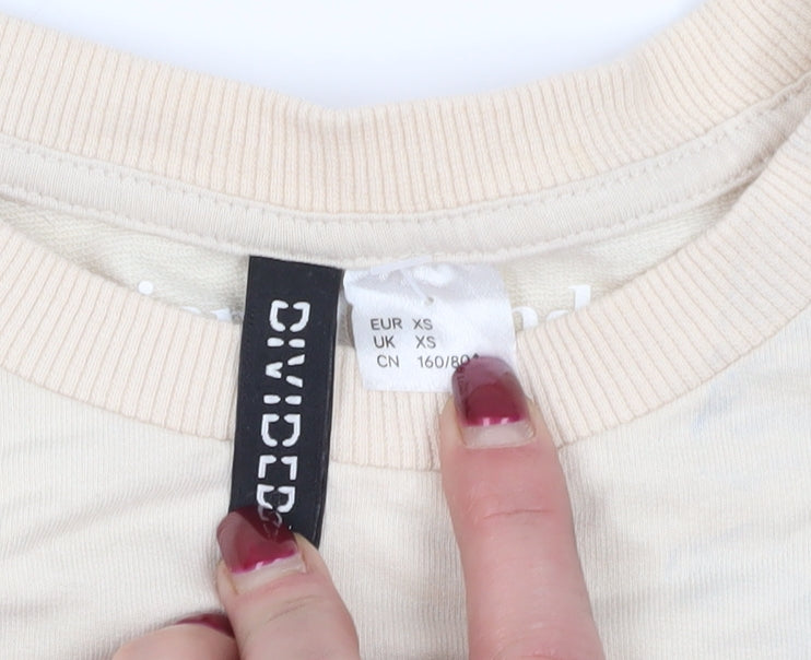 Brand and care label for Divided Beige XS Graphic Print Pullover Sweatshirt