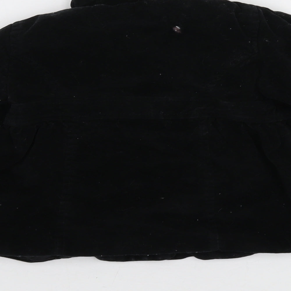 Brand and care label for Gap girls’ black jacket, size 2, years button