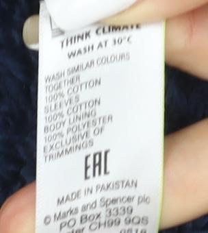 Brand and care label for Marks & Spencer boys’ blue full zip sweatshirt age 11-12