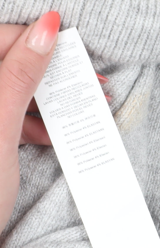 Brand and care label for Missguided women’s grey roll neck petite jumper