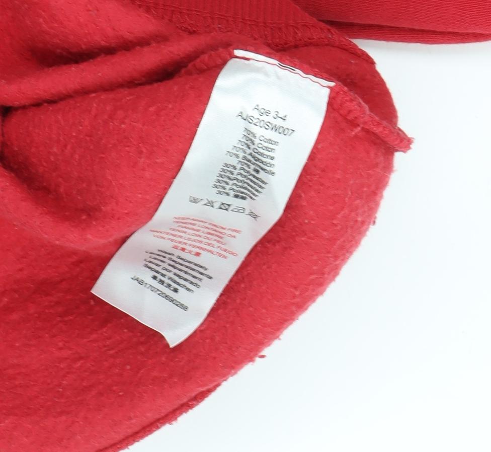 Brand and care label for Nintendo boys’ red christmas pullover sweatshirt 3-4 years