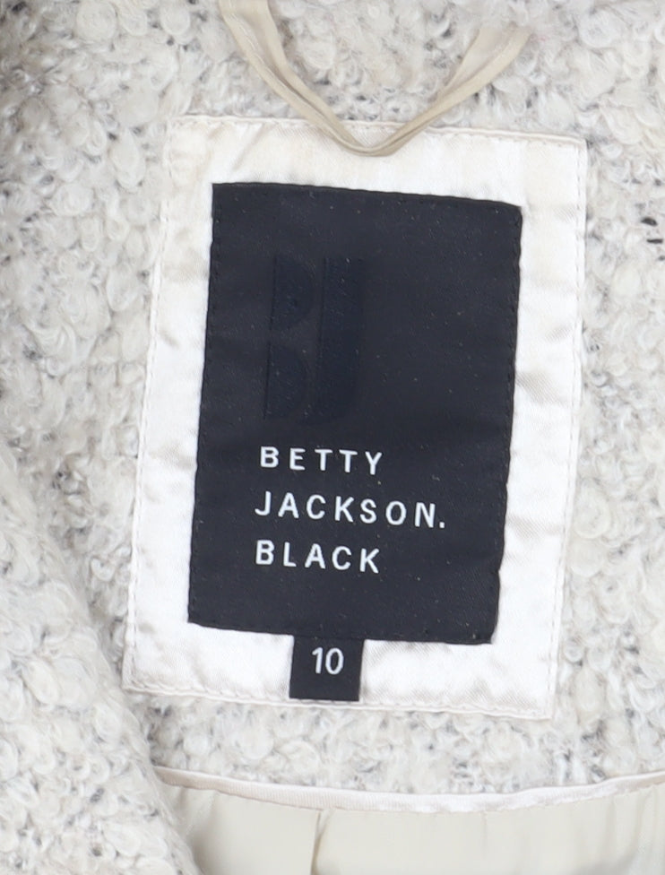 Brand and care label for Betty Jackson Black women’s ivory overcoat, size UK 10