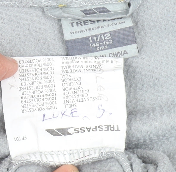 Close-up detail of Trespass boys’ grey fleece basic jacket 11-12 years full zip