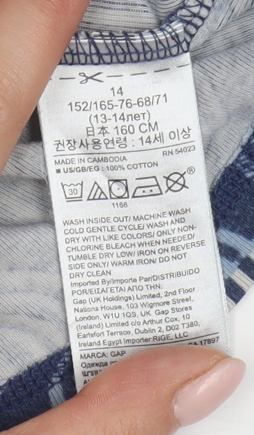 Brand and care label for Gap girls’ blue graphic print long sleeve t-shirt, 14 years