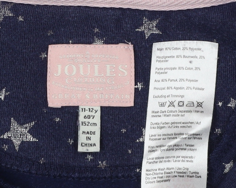 Close-up detail of Joules girls’ blue star print 1/2 zip sweatshirt 11-12 years