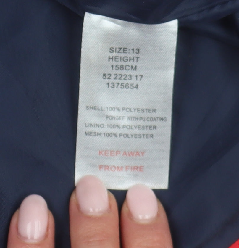Brand and care label for Peter Storm boys’ red parka jacket, size 13, hooded waterproof
