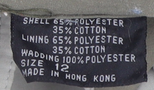 Brand and care label for Nuage Women's Green Parka Jacket, size 12, Relaxed Fit