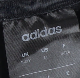 Brand and care label for Adidas boys’ black full zip hoodie - 11-12 years