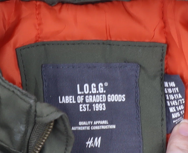 Brand and care label for H&M boys’ green mid-length parka jacket 11 years hooded