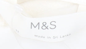 Brand and care label for Marks & Spencer Women's Ivory Camisole Tank, size 14